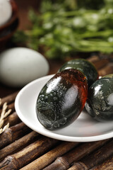 Traditional Chinese Gaoyou Preserved Duck Eggs - Lead-Free Century Eggs on White Plate