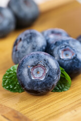 Fresh Organic Blueberries on Wooden Board - Healthy Natural Berry Fruit Close-up