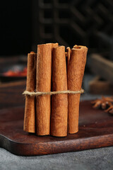 Natural Cinnamon Sticks Bundle from Guangxi - Aromatic Spice Ingredient on Wooden Board