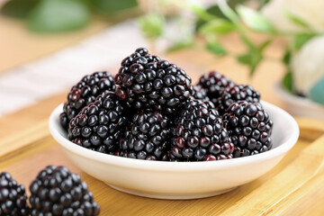Fresh Black Raspberries in Bowl - Organic Berries on Wood Background