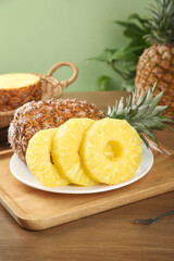 Fresh Golden Pineapple Slices and Whole Fruit on Wooden Cutting Board - Tropical Kitchen Food Photography