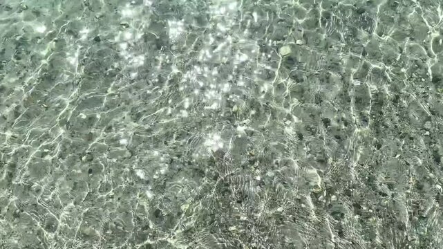 Top view of sea little waves pattern and crystal clear water. Armenia, Sevan. High quality