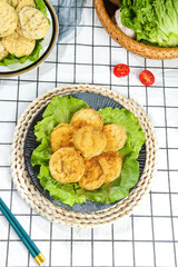 Deep Fried Golden Eggplant Slices on Lettuce Leaves - Traditional Chinese Vegetarian Cuisine