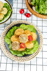 Crispy Fried Eggplant Slices with Fresh Vegetables in Rustic Wicker Basket - Healthy Vegetarian Food
