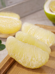 Fresh Thai Pomelo Segments on Wooden Board - Tropical Citrus Fruit