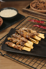 Traditional Inner Mongolia Grilled Meat Skewers on Black Slate Plate - Neimenggu Street Food Flavors