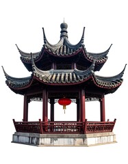 Naklejka premium Ornate three-tiered pagoda with red accents, a lantern hangs within