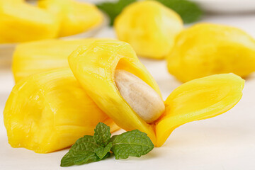 Fresh Vietnamese Jackfruit Segments with Seeds and Mint Leaves - Tropical Exotic Fruit Photography