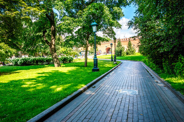 View of Alexander Garden with Cobblestone Path, Lampposts, and Lush Greenery, Moscow, Russia, 9 August 2025
