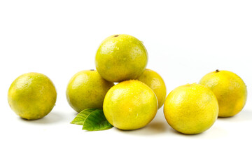 Fresh Yellow Green Limes with Leaf on White Background