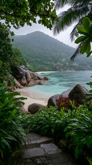 beach with clear turquoise water and pristine white sand framed by lush vegetation and rocks