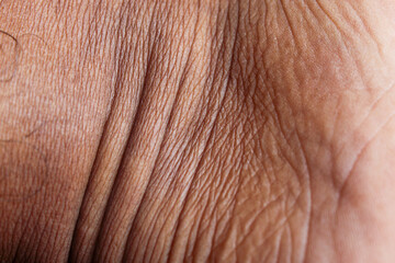 Fototapeta premium Asian man skin texture close up. Man with tan skin