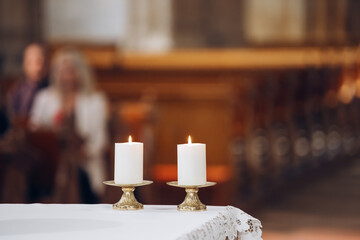 Burning candle in the church.