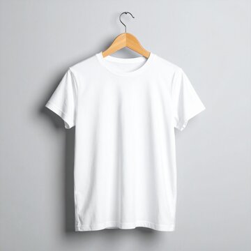 Clean white t-shirt template on a simple wooden hanger against a neutral gray studio background. Ideal for clothing brand mockups and custom designs