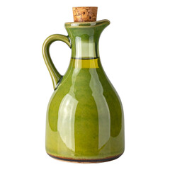 Green olive oil in a glass jar on white isolated from a pitcher