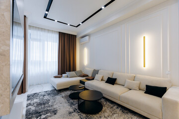 A Modern Living Room beautifully crafted with an Elegant Design and abundant Natural Light
