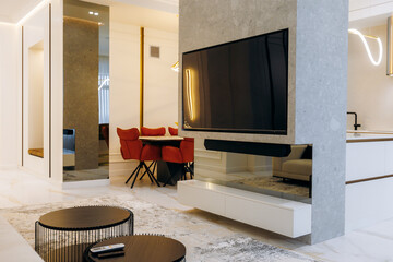 A Modern Living Room featuring a Sleek Design that creates a Cozy and Inviting Ambiance