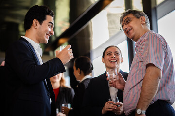 Business professionals engaging in meaningful conversation at a corporate event, showcasing collaboration, leadership, and modern business culture. Old fashioned meeting without technology.