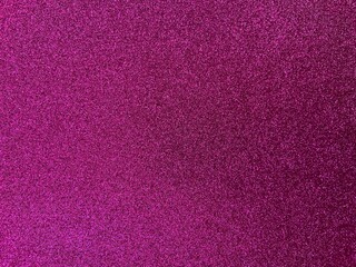 Sparkling pink glitter texture, close-up of shimmering surface with autumn-inspired warmth, festive charm, and cozy decorative appeal