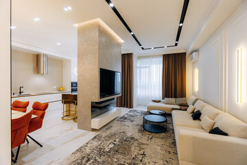 A modern living room that features an elegant design combined with a spacious open layout