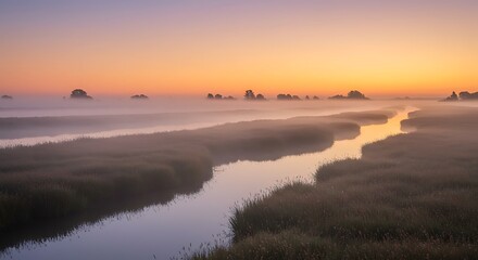 Fototapeta premium Tranquil river landscape at dawn with atmospheric mist and colorful sky
