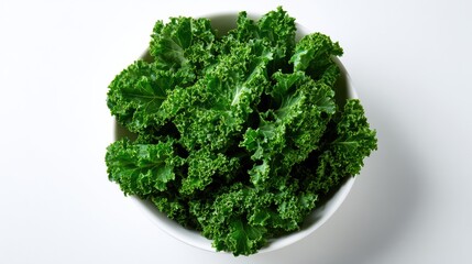 Fototapeta premium Fresh and nutritious kale leaves in a white bowl, perfect for healthy recipes and salads.