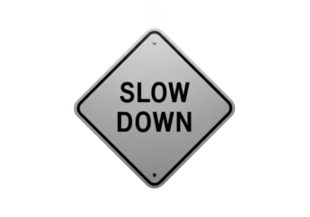 Diamond shaped slow down road sign against dark sky isolated on transparent background
