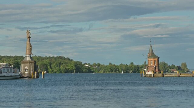 Small Lighthouse on old pier in harbor of Constance - Germany. Handheld and stabilized
