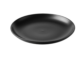 A single, pristine, empty black ceramic dinner plate, round, glossy, with soft studio lighting against a transparent background with copy space, concept of elegant modern crockery