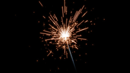 Celebration Sparkler Glowing with Soft Golden Bokeh