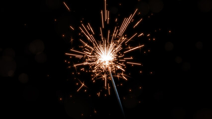 Celebration Sparkler Glowing with Soft Golden Bokeh