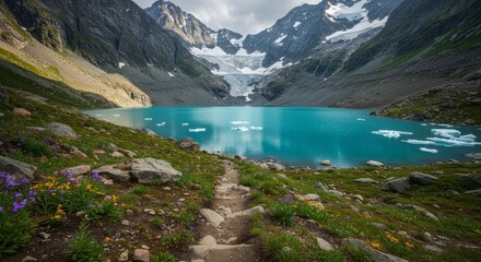 Obraz premium Scenic mountain lake landscape with turquoise water reflecting the peaks and glaciers under daylight