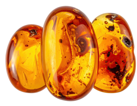 Three polished amber gemstones