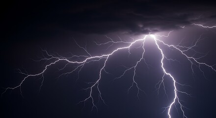 Vibrant lightning strikes across dark dramatic sky showing electrical power