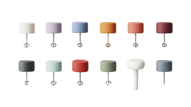 Twelve Cylinder Lamps in Various Pastel Colors on Black Background