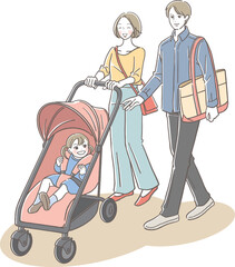 笑顔でベビーカーを押す母親と父親