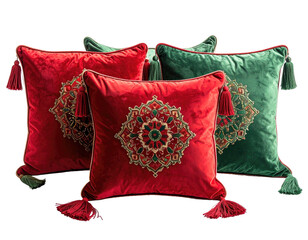 Four decorative velvet pillows in red and green. Embroidered floral designs. Tassels