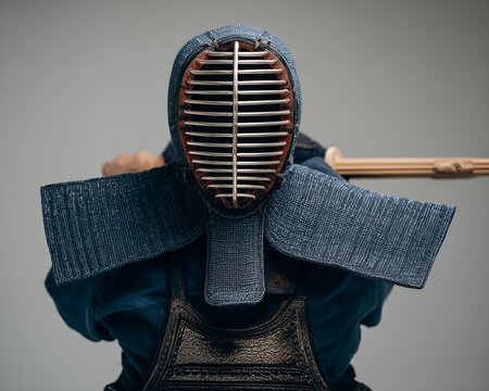 Kendo fighter in protective gear (3)