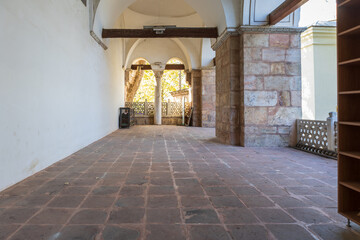 Ottoman mosque entrance hall with stone columns and arches in Bursa Murad Hudavendigar Mosque.