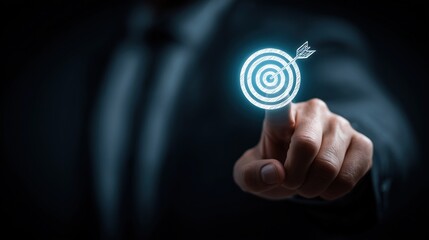 A businessman in a suit points at a glowing target symbol with a dart hitting the center. The scene conveys focus and goal achievement in a corporate environment.