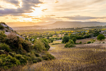 View on rugged terrain and landscape around Plagaro and the Iglesia de San Pedro de Plagaro located in Villaescusa de Tobalina, province of Burgos