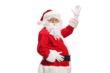 Santa Claus waving at camera