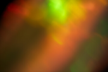 light leak overlay effect with bokeh rainbow light leaks,retro noisy film texture light leak flare on black background,abstract colorful background,glowing lights in the night