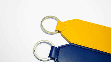 Luggage tags for suitcases photographed on a white background. Concept of travel accessories, personalized tags, custom design, and modern travel essentials