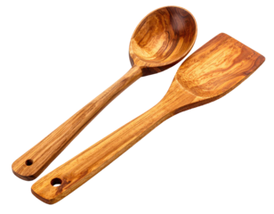Two wooden cooking utensils, a ladle and a spatula, lie parallel
