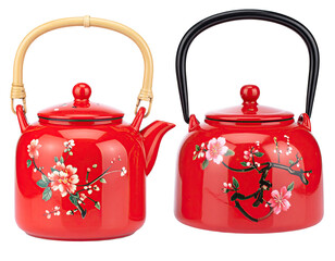 Two red teapots with floral designs