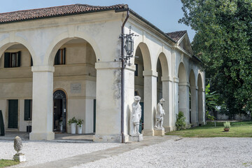 covered walkway at  Widmann manor house colonnade on Brenta canal, Mira, Italy