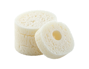 Two off-white porous cylindrical discs, stacked and layered, with a central hole in one