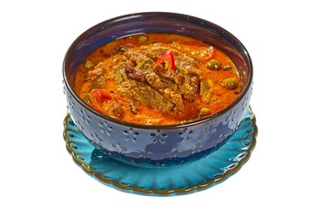 Authentic Thai Red Curry with Roasted Duck (Gaeng Phed Ped Yang) in a Dark Blue Bowl