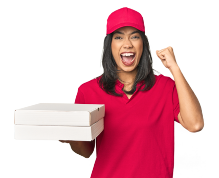 Latina delivering pizza, studio setup raising fist after a victory, winner concept.